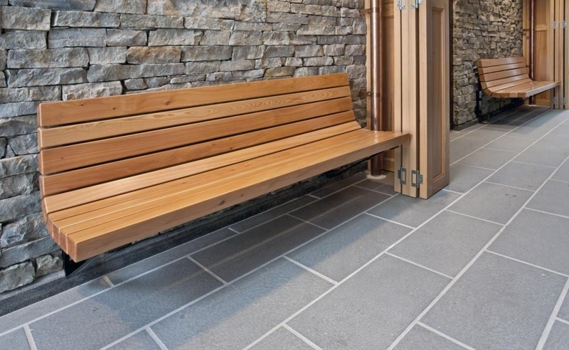 Modern Wall-Mounted Wooden Slat Benches with Stone Wall