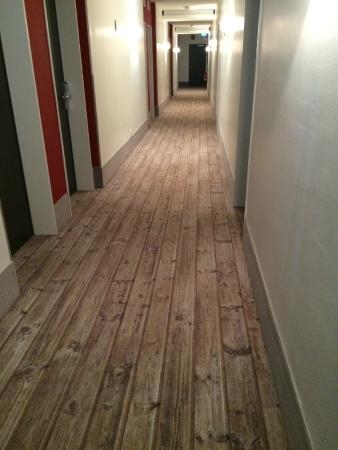 Realistic Hardwood-Look Carpet in Hallway