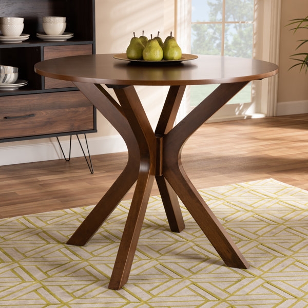 Round Wood Dining Table with Unique Legs