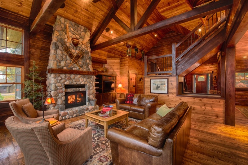 Rustic Cabin Living Room with Stone Fireplace