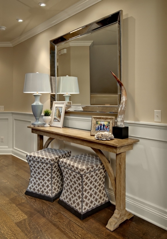 Rustic Console Table with Patterned Ottomans and Mirror