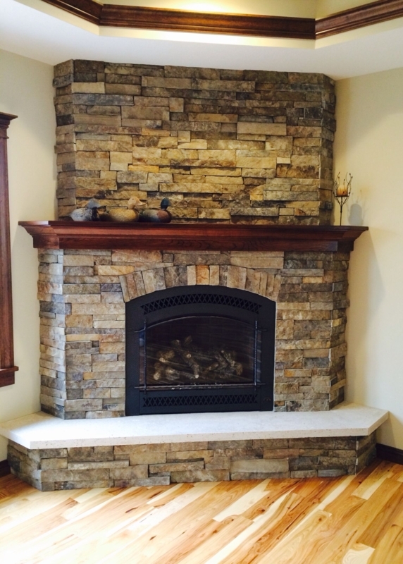 Rustic Stone Corner Fireplace with Cherry Wood Mantle