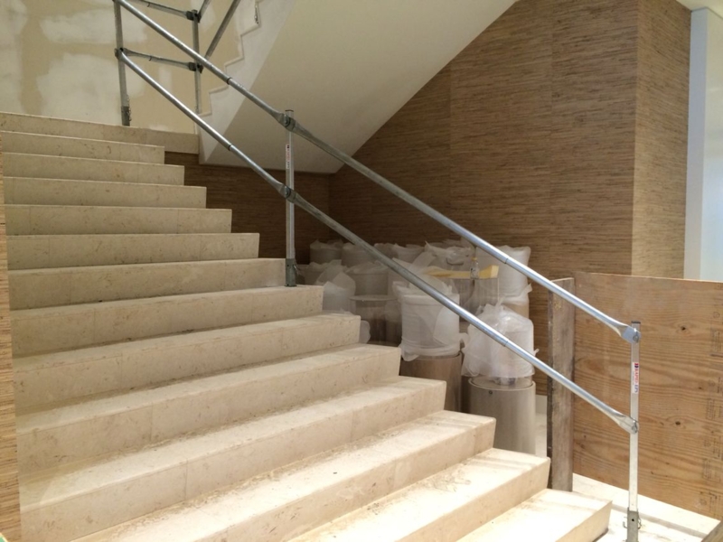 Temporary Safety Railing on Modern Stone Staircase