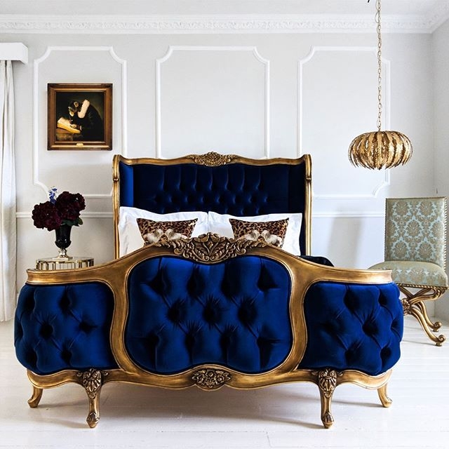 The most luxurious dark blue velvet chesterfield and gold bed in a ...