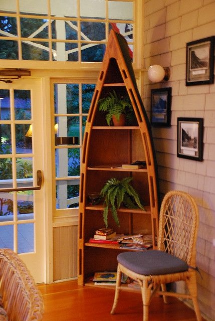 Unique Canoe-Shaped Bookshelf for Living Room