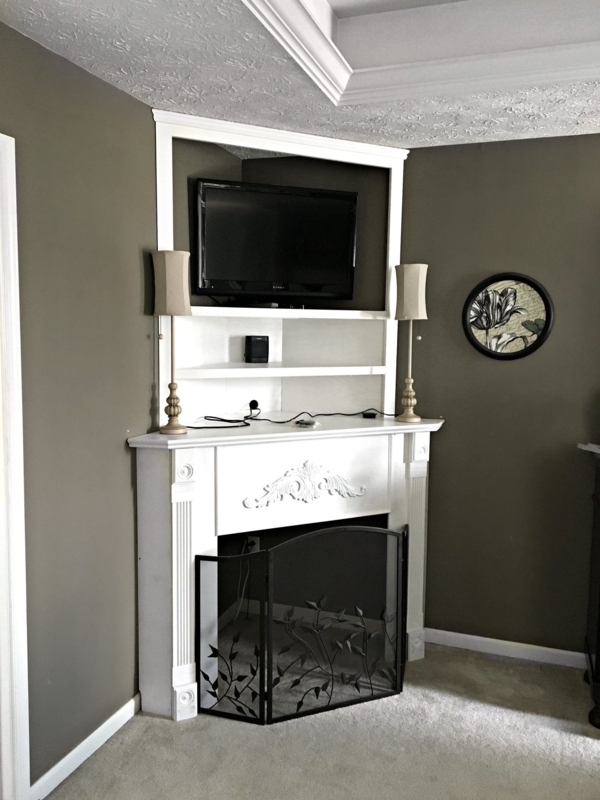 White Corner Fireplace Mantel with Built-in TV Nook