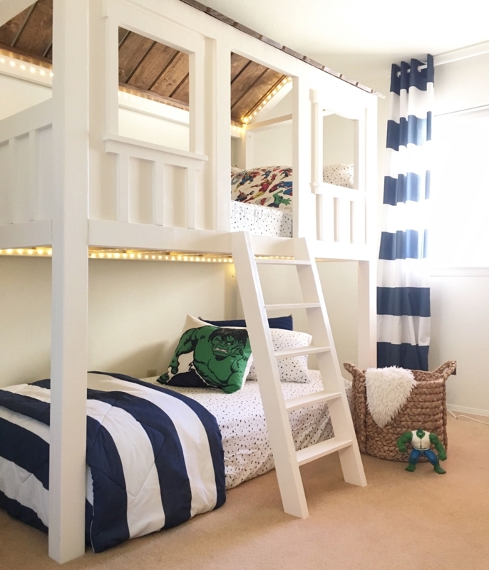 White Loft Cabin Bed with Kids' Playful Decor