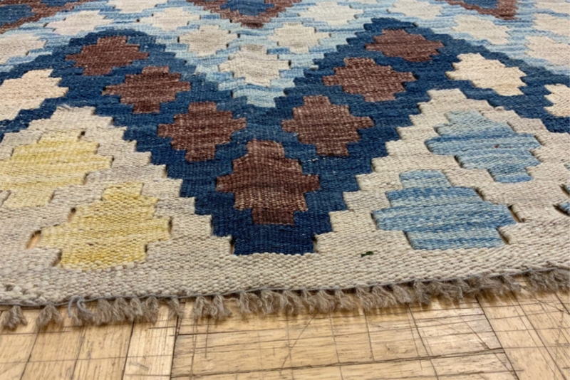 Bold Geometric Masculine Area Rug with Earth Tones