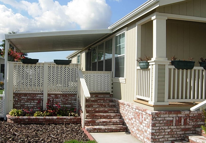 Charming Mobile Home Enclosed Porch with Brick Steps