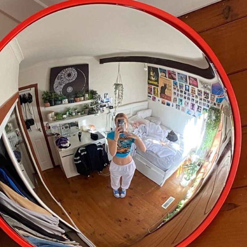 Convex Red Traffic Sign Mirror in Cozy Bedroom