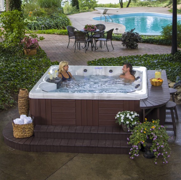 Cozy Backyard Hot Tub and Pool Relaxation Area