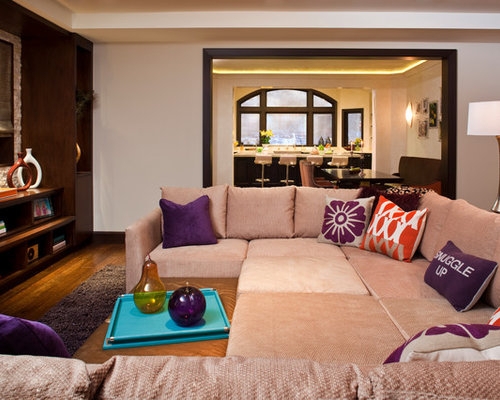 Cozy Beige Sectional Sofa with Vibrant Accent Pillows