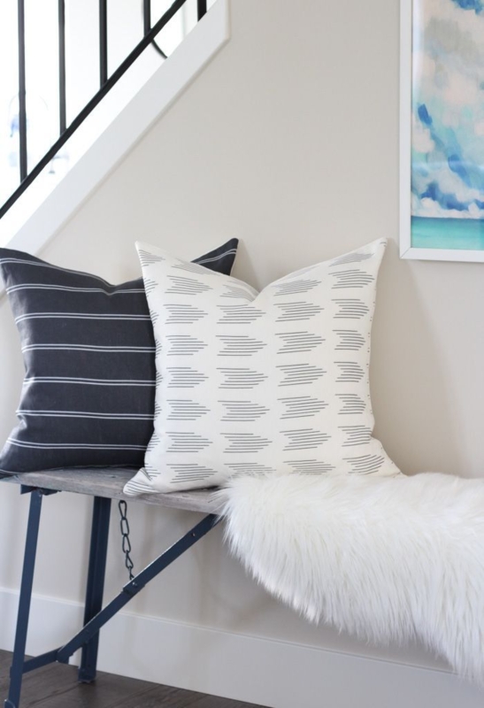 Cozy Bench Styling with Patterned Pillows and Fur Throw