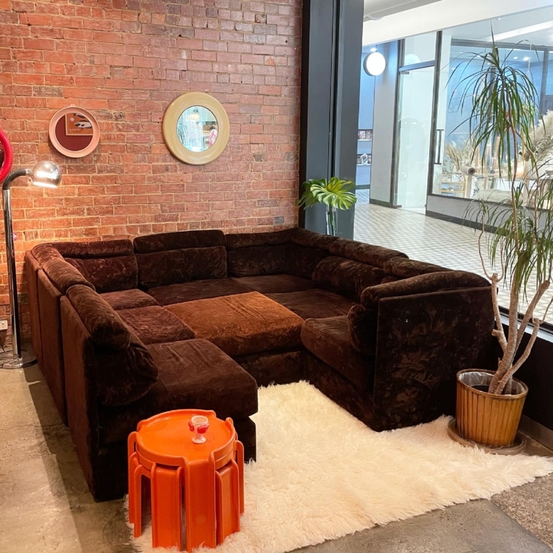 Cozy Dark Brown Playpen Sectional Sofa with Brick Wall