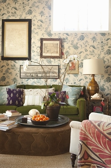 Cozy Living Room with Moss Green Sofa and Floral Accents