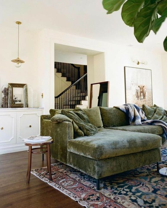 Cozy Moss Green Velvet Sofa in Elegant Living Room
