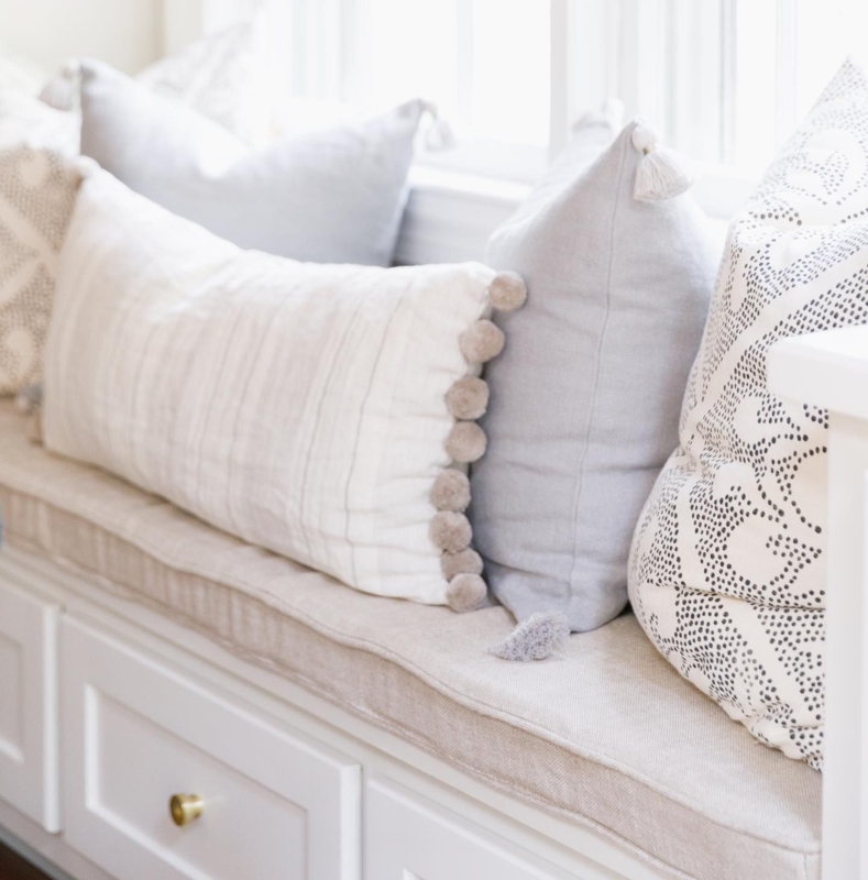 Cozy Neutral Window Seat with Decorative Pillows