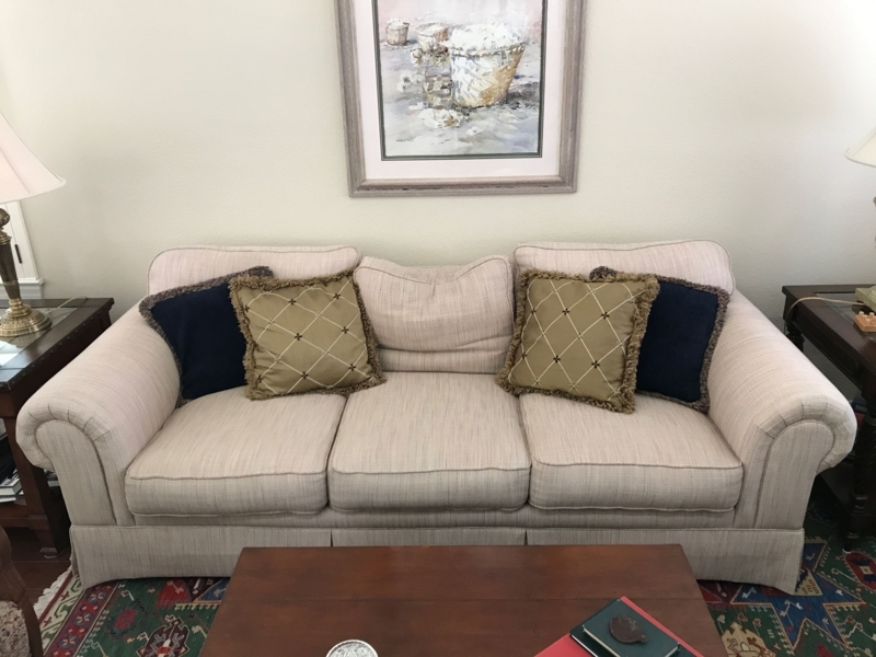 Cozy Oatmeal Colored Couch with Accent Pillows