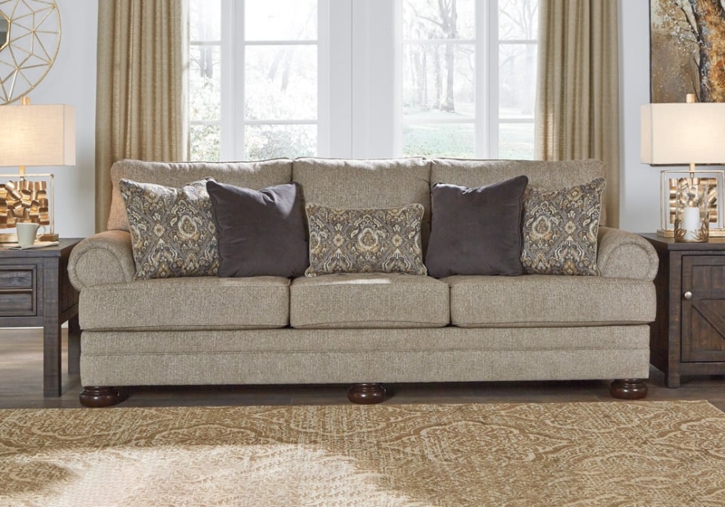 Cozy Oatmeal Sofa with Patterned Accent Pillows
