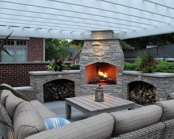 Cozy Outdoor Patio Corner with Stone Fireplace