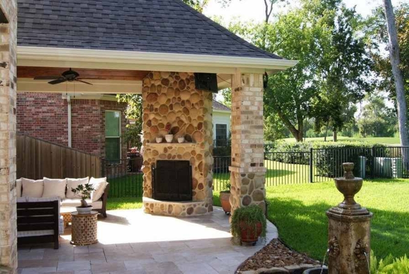 Cozy Outdoor Stone Fireplace Patio Design