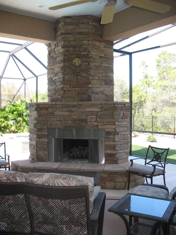 Cozy Stone Patio Corner Fireplace with Outdoor Seating