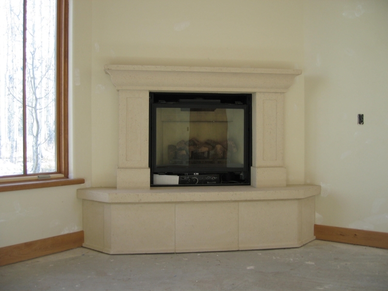 Elegant Corner Gas Fireplace with Stone Mantel