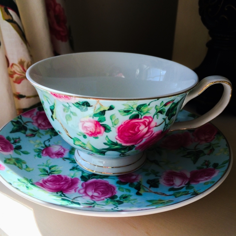 Elegant Floral Teacup and Saucer Set