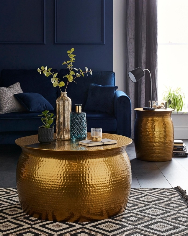 Elegant Gold Drum Coffee Table in Modern Living Room
