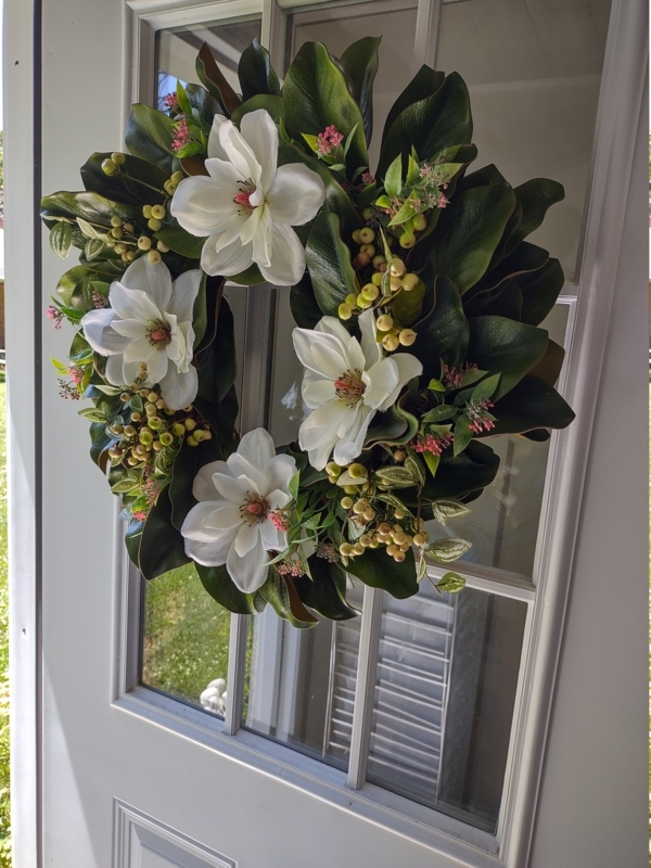Elegant Magnolia Wreath with Berries on White Door