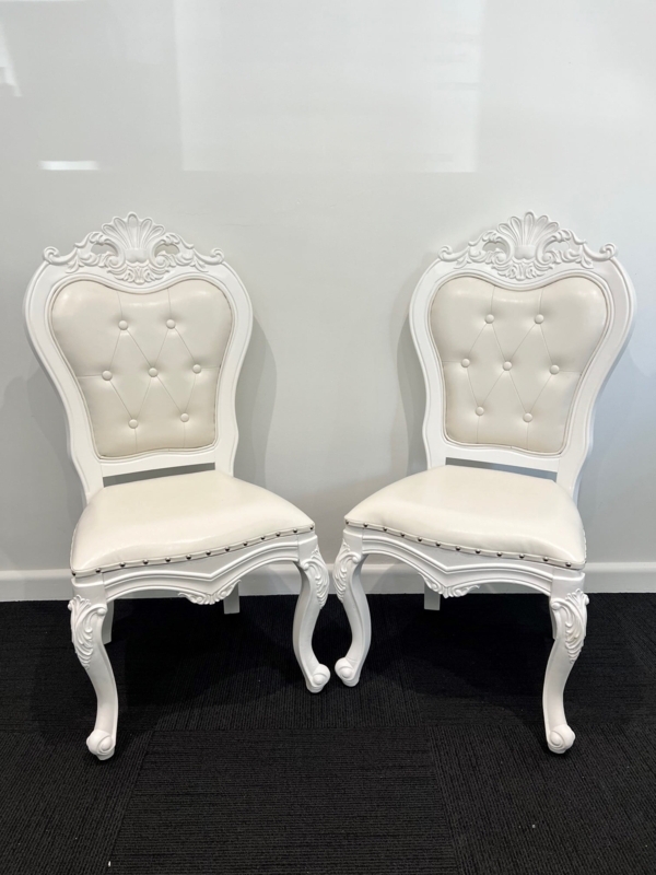 Elegant White King and Queen Chairs for Weddings