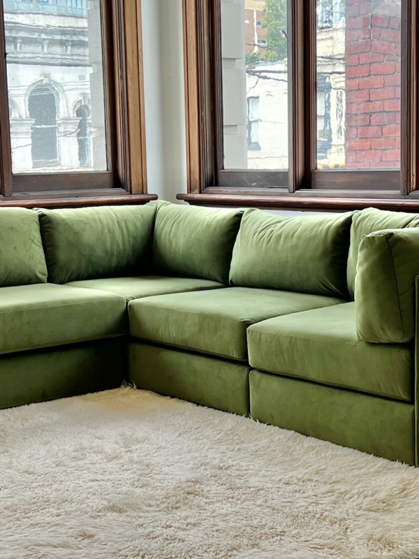 Green Modular Corner Sofa with Plush Cushions