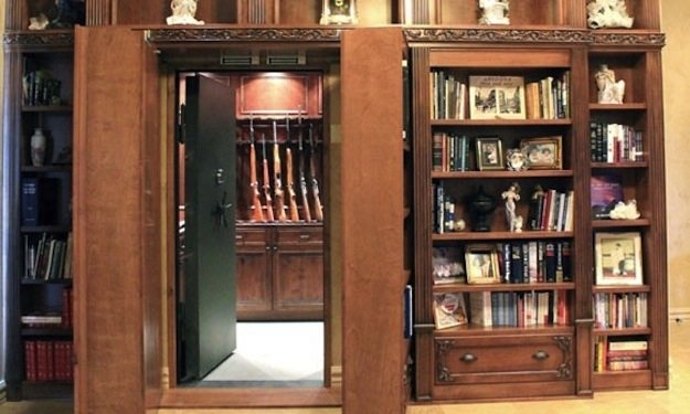 Hidden Library Door Concealing Secret Gun Room