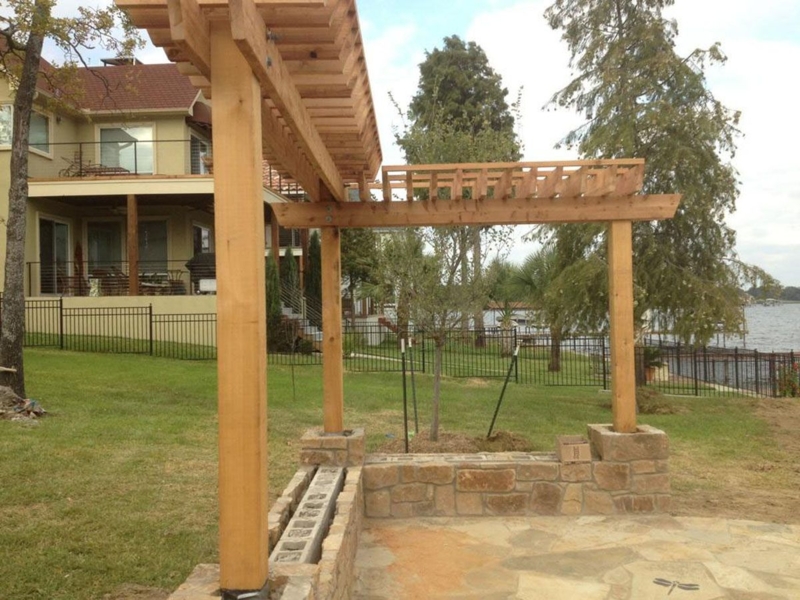 L-Shaped Wooden Pergola with Stone Base for Backyard