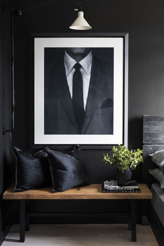 Masculine Black Bedroom with Elegant Artwork