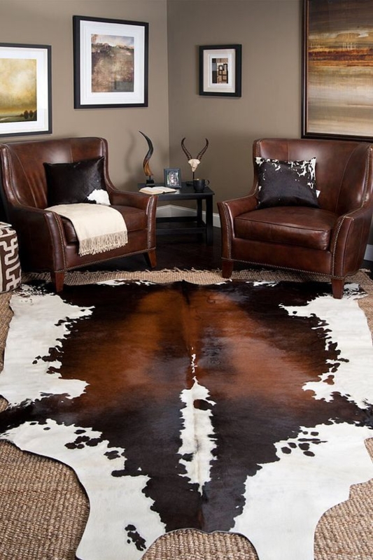 Masculine Leather Chairs with Cowhide Rug