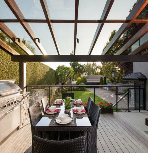 Modern Glass Roof Pergola with Outdoor Dining Area