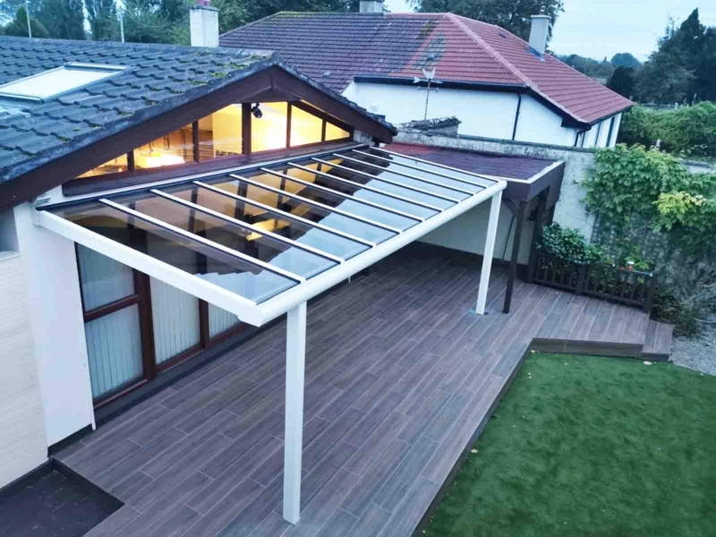Modern Glass Veranda with Sleek Awnings