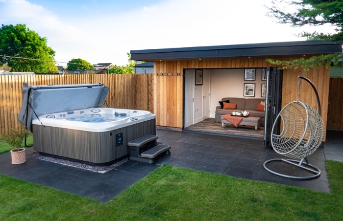 Modern Outdoor Hot Tub with Cozy Backyard Lounge