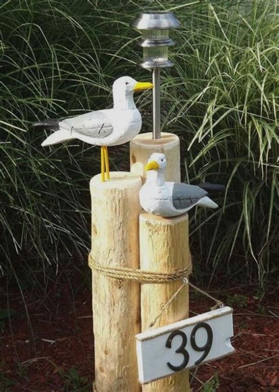 Nautical Outdoor Decor with Seagull Statues and Wooden Posts
