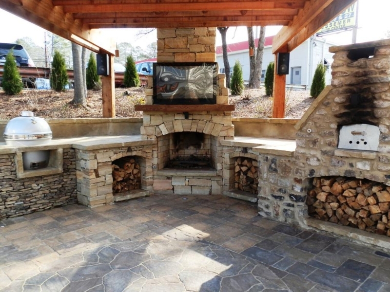 Rustic Corner Outdoor Fireplace with Stone Accents