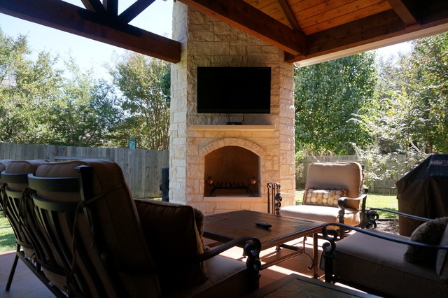 Rustic Elegance: Round Rock, TX, Covered Patio with Cozy Corner Fireplace