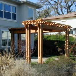 Wooden Cedar Pergola Enhancing Backyard Patio Space