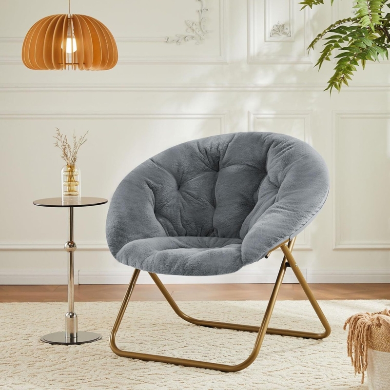 Accent Chair boasting cool gray faux fur; a gray faux fur saucer chair.
