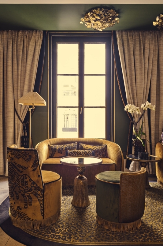Accent Chair Golden Ochre Fringe Trim Leopard Print Rug Green Ceiling