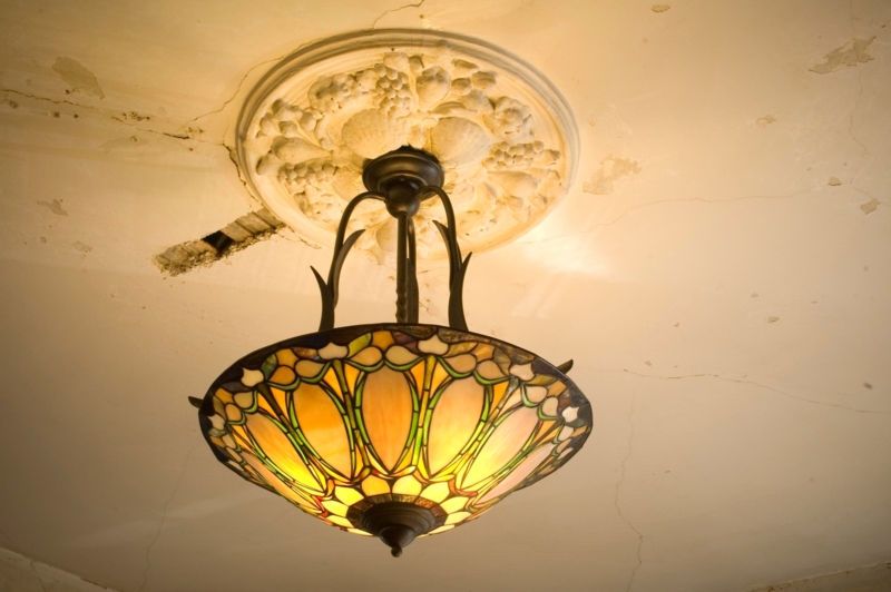 Amber Glass Bowl Pendant Light with Curved Arms and Floral Motif