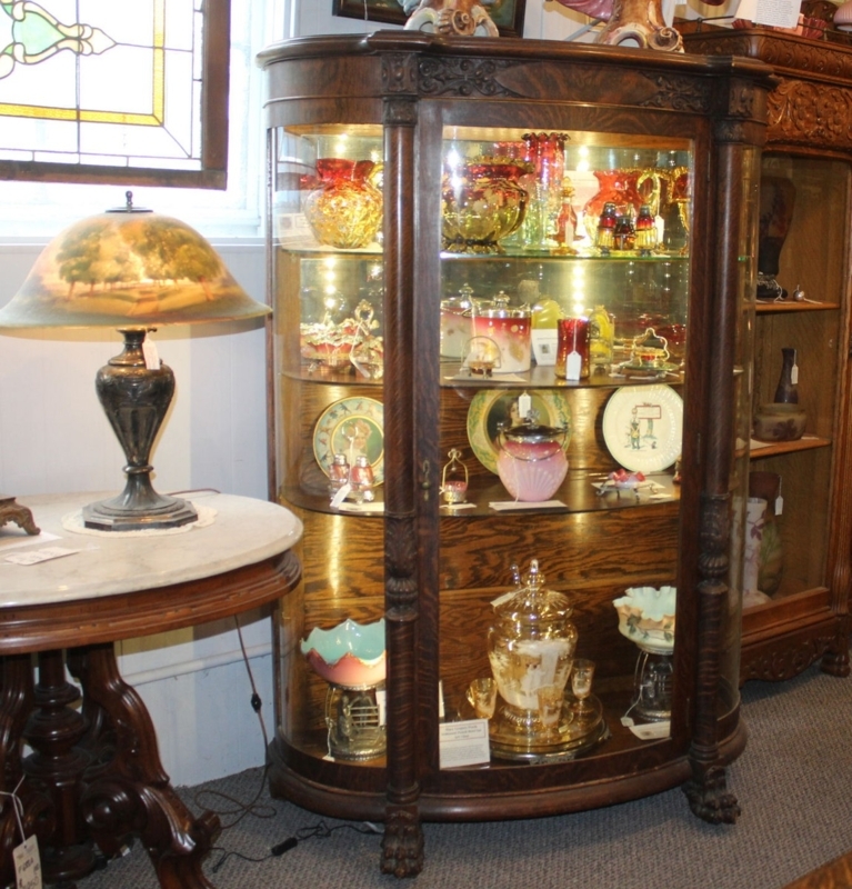 Antique Curved China Cabinet with Carved Columns and Claw Feet