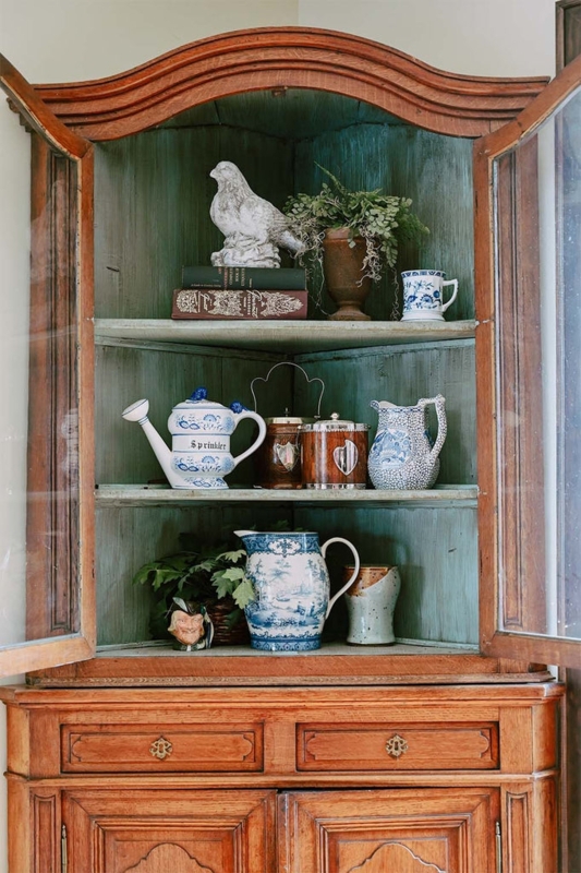 Antique Style Corner Cabinet with Teal Distressed Interior and Arched Top
