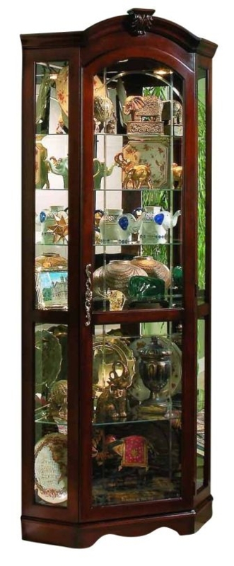 Arched Corner Curio Cabinet with Decorative Medallion and Ornate Pull