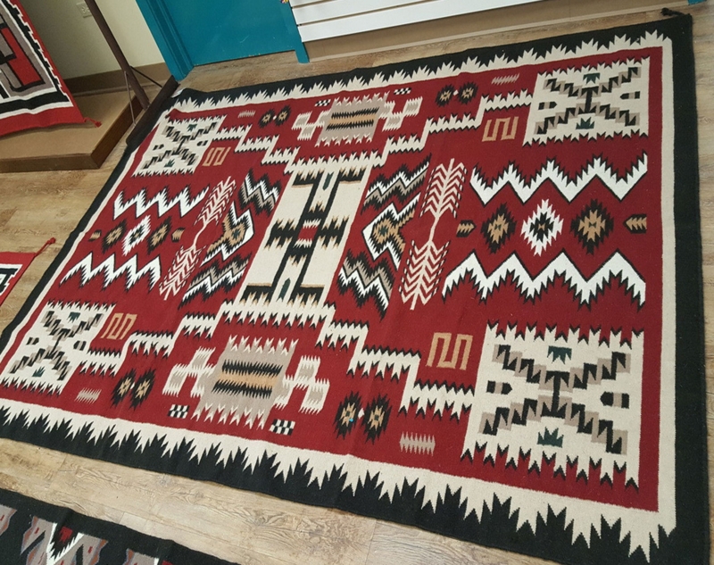 Area Rug Navajo Storm Pattern in Deep Red with Sawtooth Border